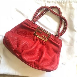 Red fendi purse cream Prada purse